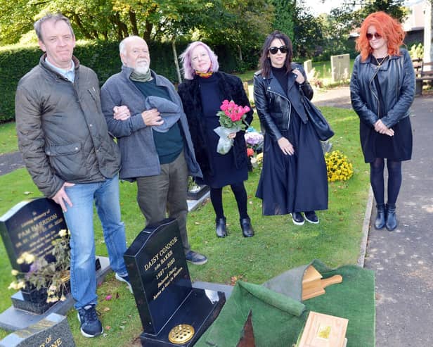 Daisy Connor's family lay her ashes to rest. From left are grandson Andrew Davies, son-in-law Bill Davies, daughter Christine Davies and granddaughters Andrea and Charlotte Davies