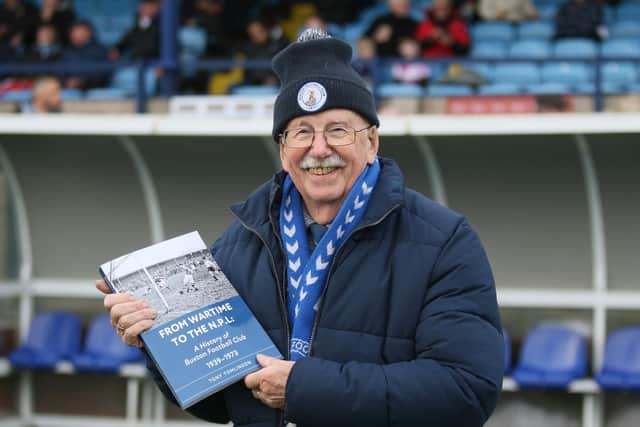 Tony Tomliunson with his book on Buxton FC's post war exploits. Photo Jason Chadwick