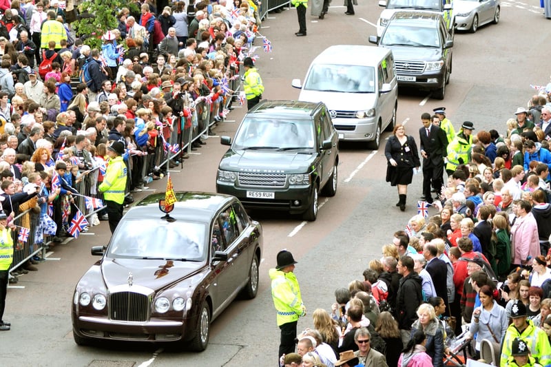 The Royal cavalcade makes its way through the centre of Alnwick to pick up the Royal party as wellwishers pack into Bondgate Within.