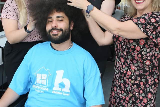 Charity trekkers Amy and Wendy Bainbridge with Yahia Baklouti who is having his Afro cut off for the same good cause, with Lisette Bradbury of Just Divine Hair. Photo Jason Chadwick
