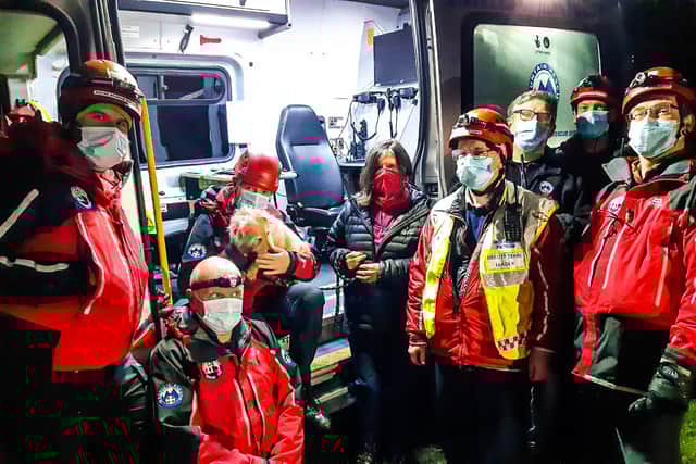 Buxton Mountain Rescue Team members with the dog