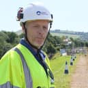 Dilwyn Parry, engineer for the Canal & River Trust, on top of the dam at Toddbrook Reservoir.