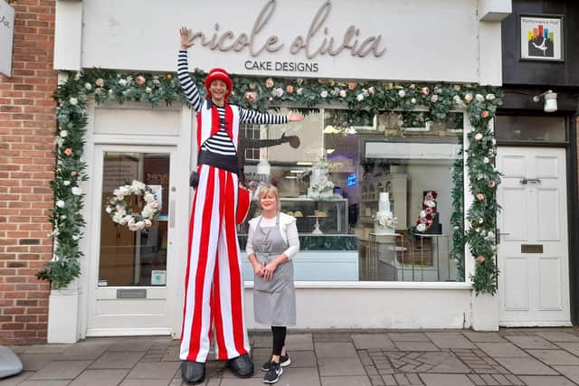 stiltwalker at Nicole Olivia Cake Design