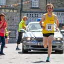 Will Tighe on his way to victory in the Buxton Carnival race.