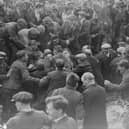 A game of Shrovetide football, ' kicked - off ' by the Prince of Wales in Ashbourne, is getting rather rough, in February 1928.