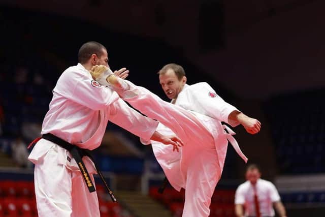 Anthony Knibb, right, on his way to becoming world champion.