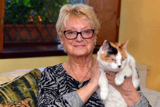 Sandra Cameron-Pilkington with Miss Lilly - a female cat she rescued after finding her abandoned as a kitten