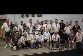 Sheen team with trophies and medals