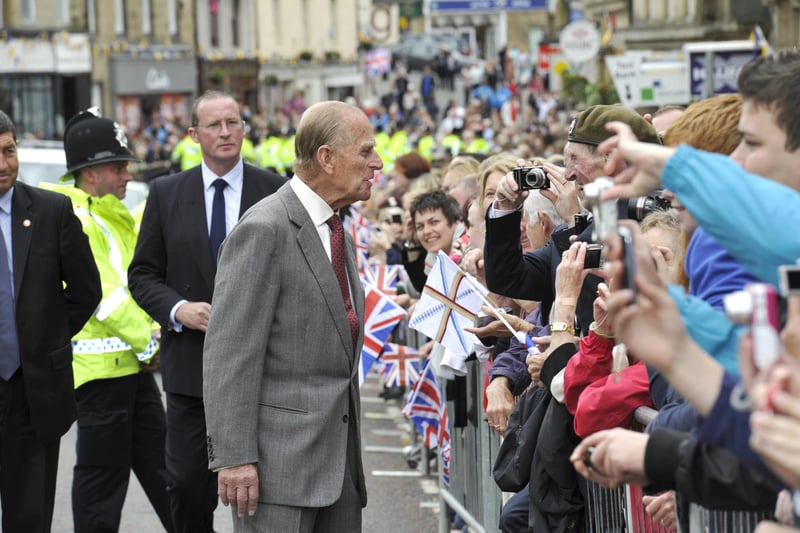 Plenty of cameras to record the occasion as the Duke of Edinburgh converses with the people of Alnwick.