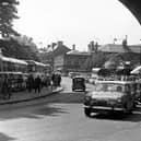 A thriving Buxton with shoppers and tourists filling Spring Gardens in 1965