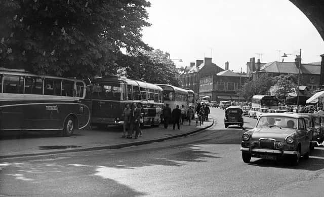 A thriving Buxton with shoppers and tourists filling Spring Gardens in 1965