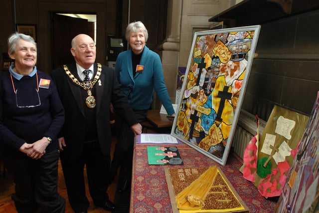 Marion Overton and Johanna Partridge show Mayor Pat Jenner around the Easter art exhibition at St John's Church in  Buxton back in 2013. Photo Jason Chadwick
