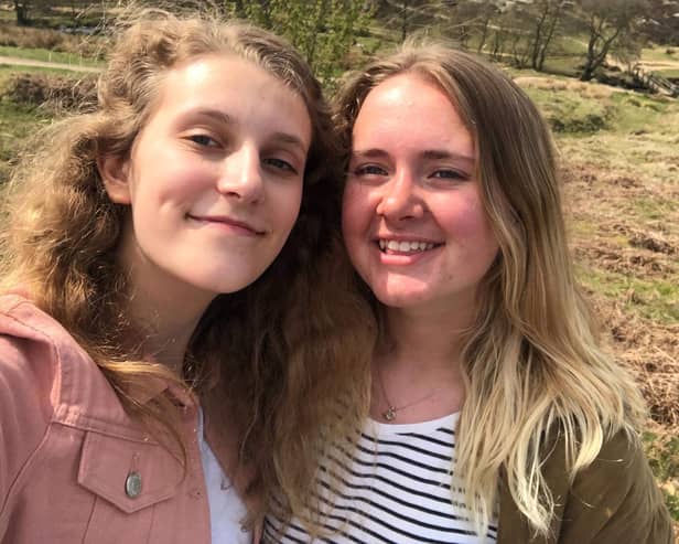 Buxton friends Annie Baldwin, left, and Abbie Ingleby are selling Christmas cards for three charities close to their hearts