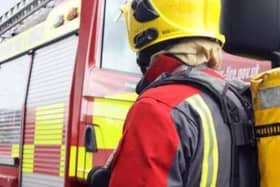 Firefighters and police are dealing with an incident in New Mills