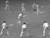 Derbyshire's Alan Revill looks down at the stumps after being clean bowled for 0 by Eddie Watts during the first innings of their County Championship match againast Surrey on 20th June 1946 at the Kennington Oval. The match was drawn.