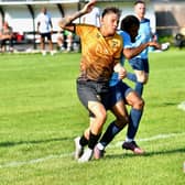 Kyle Oakes is brought down on Saturday - picture by John Fryer.