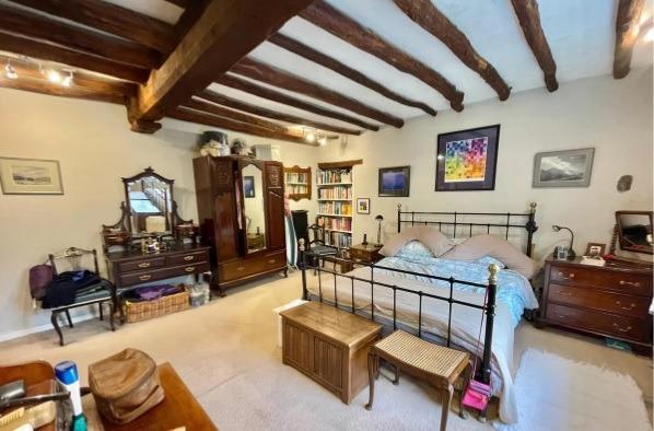 The restored property offers two charming bedrooms.