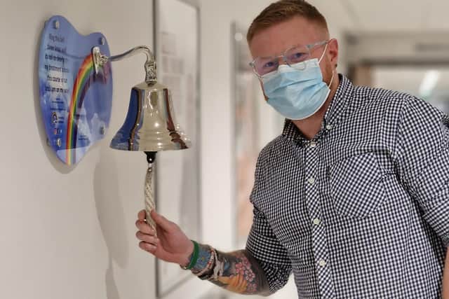 The moment when Matt Heywood rang the bell to signal the end of his cancer treatment at the Christie last month.