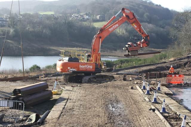 Piling for side weir and tumble bay at Toddbrook Reservoir.