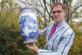 Charles Hanson with the rare Chinese vase he spotted under a table in someone's house