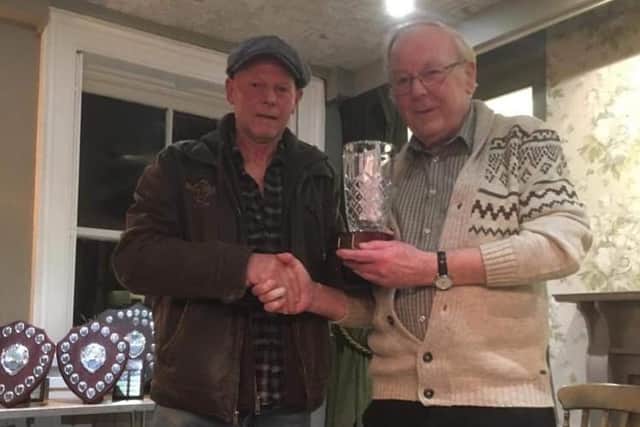 Steve Stringer, right, receives an award presented by Stephen Nuttall, New Mills & District 501 darts league chairman