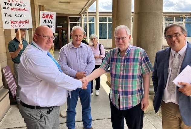 Pictured, Left To Right, Are Derbyshire County Cllr Joss Barnes, Council Leader Alan Graves, Belper Together Chairperson Keith Venables And Council Deputy Leader Robert Reaney, Taken By Ldr Jon Cooper