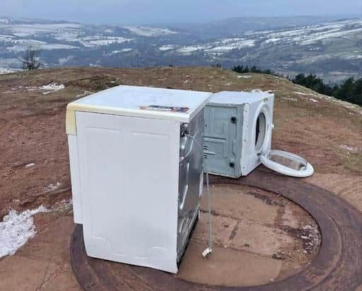 The washing machine and a tumble dryer were hauled on foot over 400 metres through rocky terrain. Photo: Jane Inglefield