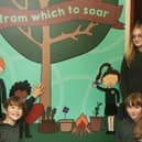 Year sixes Ethan, Joe, Millie and May with one of the new murals that have been installed at Kettleshulme Primary. Photo Jason Chadwick