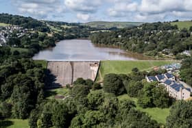 Drone images show the damage to the dam and empty streets of Whaley Bridge in August 2019.