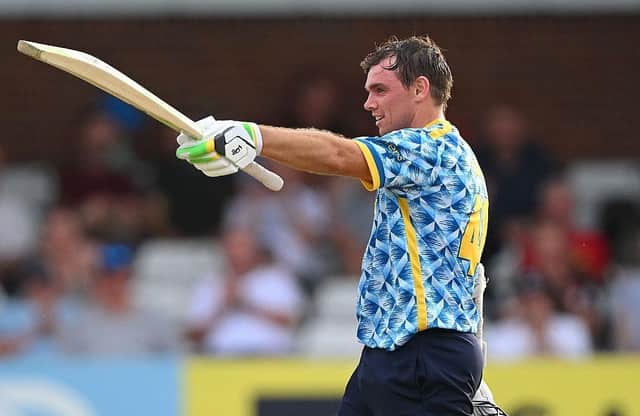 Tom Latham celebrates his century during f Birmingham Bears' huge win at Derbyshire Falcons.