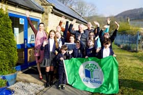 Eyam Primary School  celebrates the installation of its solar panels. Headteacher Oona Gilbertson, school eco teamand head pupils, welcome Ghazala Ahmed-Mear to launch the solar panels. Photo Brian Eyre