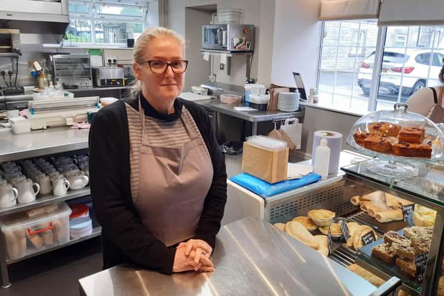 Claire Nicklin, of Peveril Tea Rooms, did record business last year, but fears for the future of Castleton.
