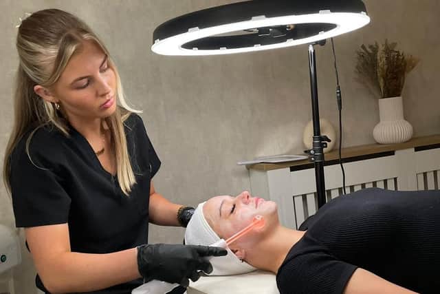 Shannon Tarrant giving a facial to a client. Photo submitted