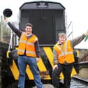 Neil Ferguson-Lee and volunteer Matt Higham celebrate the extension of the Eccclesbourne Valley Railway to Duffield