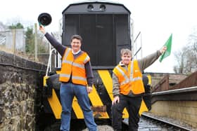Neil Ferguson-Lee and volunteer Matt Higham celebrate the extension of the Eccclesbourne Valley Railway to Duffield