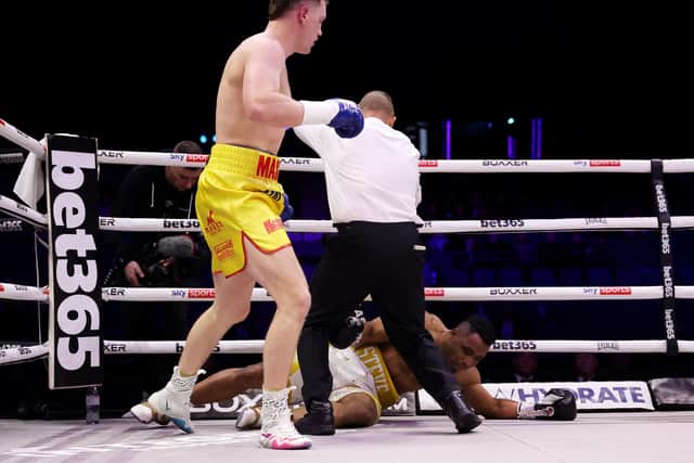 Jack Massey looks down at Steve Eloundou Ntere having knocked him out on Saturday. Photo: Getty Images.