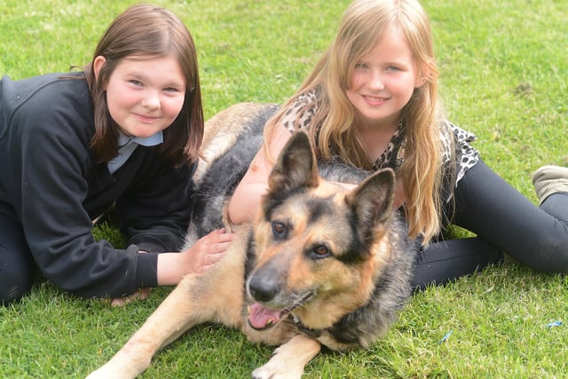 Katie Kettyles and Maddie Harvey with Maddie's dog Sasha Photo Jason Chadwick