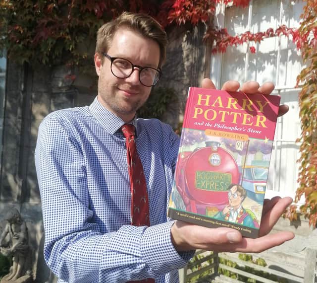 Jim Spencer with the Harry Potter first edition