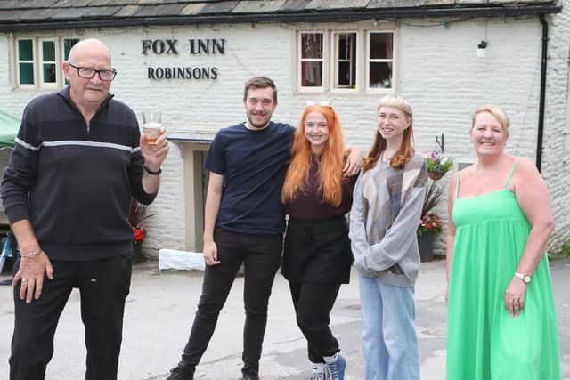 Forty years after taking on the Fox Inn in New Mills, Terry Wild and daughter Melanie with Jack, Annice and Lily from the third generation of the family to work there
