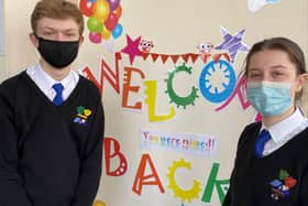 St Thomas More pupils celebrating the return back to the classroom after eight weeks of online learning