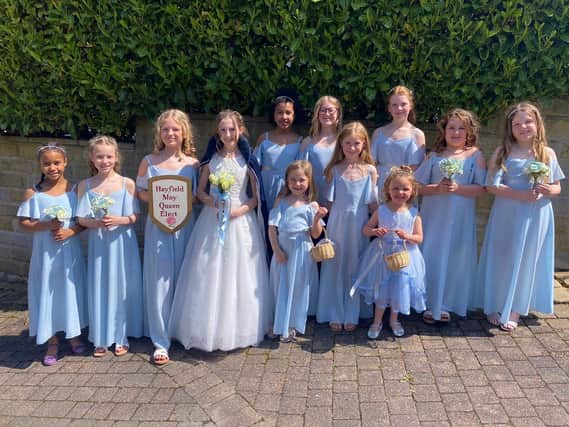 The newly crowned Hayfield May Queen Ava Grace with princess Tilly, Rosebud Fleur, and the rest of her royal retinue for 2023. Pic Hayfield May Queen
