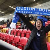 A fan celebrating a Buxton win last year during the FA Cup.