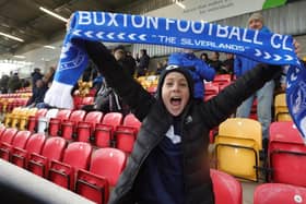 A fan celebrating a Buxton win last year during the FA Cup.