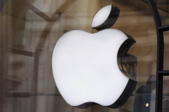 Logo in the window of an Apple Store. PIC: Yui Mok/PA Wire