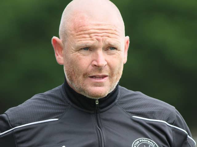 Buxton boss John McGrath was delighted to see off Scunthorpe.