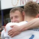 Buxton's players celebrate after their win all but mathematically secured the league championship.
