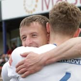 Buxton's players celebrate after their win all but mathematically secured the league championship.