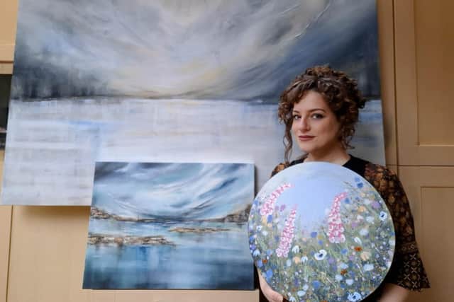 Francesca Bilinis with some of her art work as she marks ten years as an artist. Photo submitted