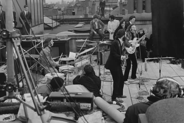 The Beatles performing their last live public concert on the rooftop of the Apple Organization building (Photo by Evening Standard/Hulton Archive/Getty Images)