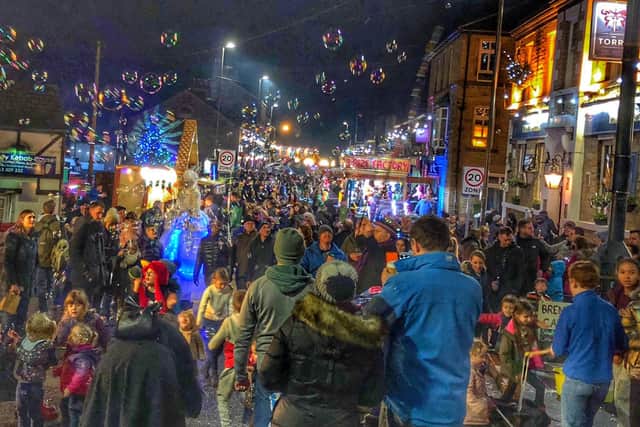 Packed streets at the 2021 lights switch on in New Mills. Pic Visit New Mills.